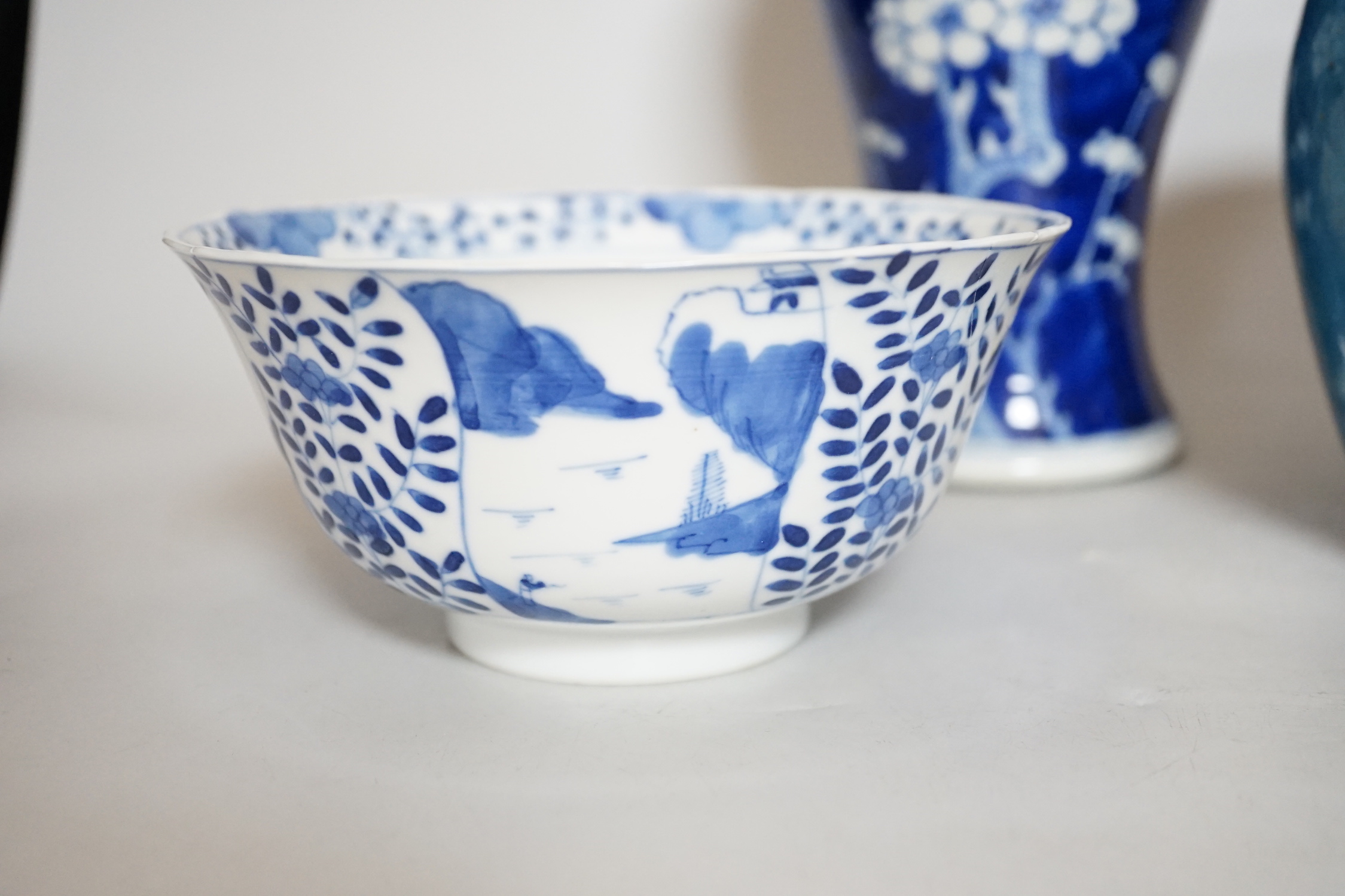 A Chinese blue and white prunus vase, a Jun type pottery planter and a blue and white bowl, vase 25.5cm high